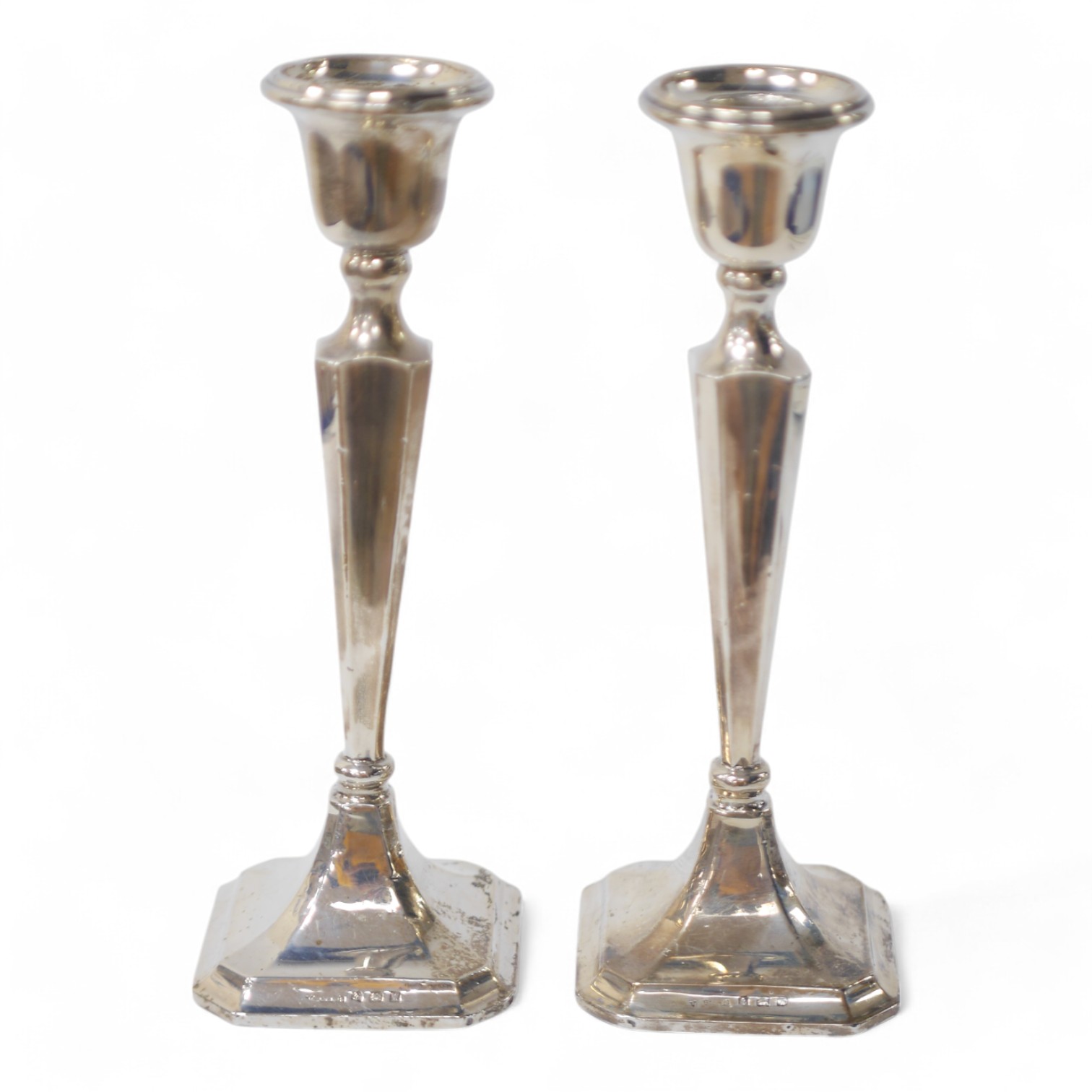 A pair of George V silver candlesticks, Birmingham, 1921, 19.9cm, weighted. Condition - poor